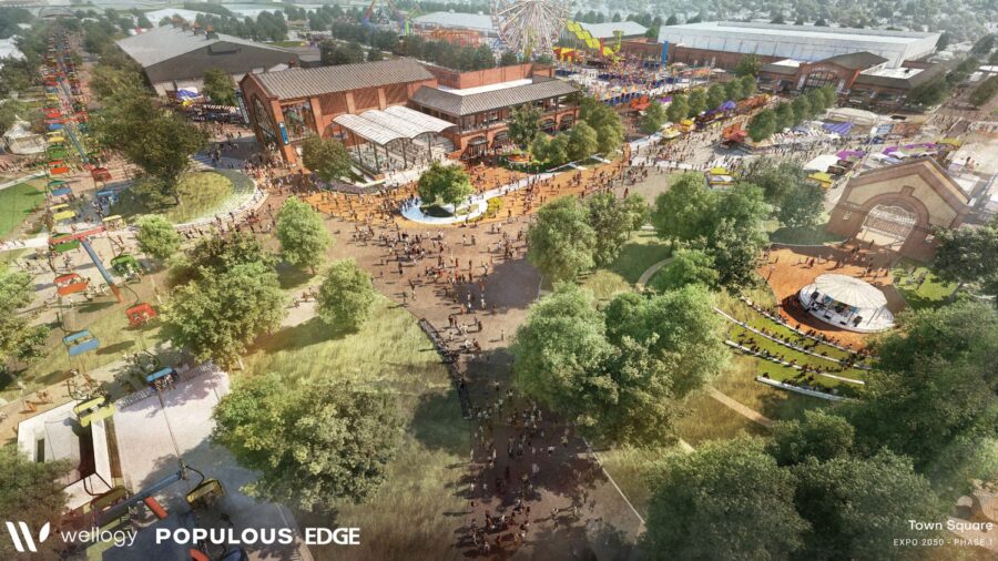 A rendered aerial shot of a large, semi-wooded common area surrounded by some buildings.