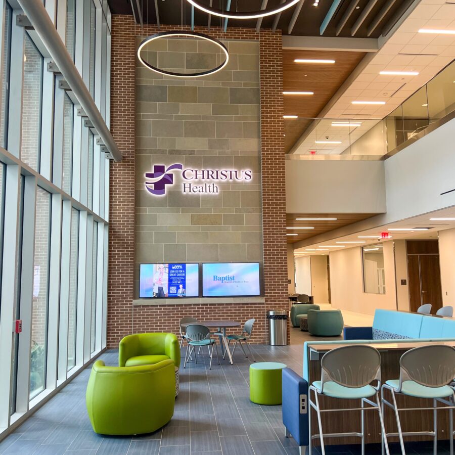 indoor open area with chairs and windows