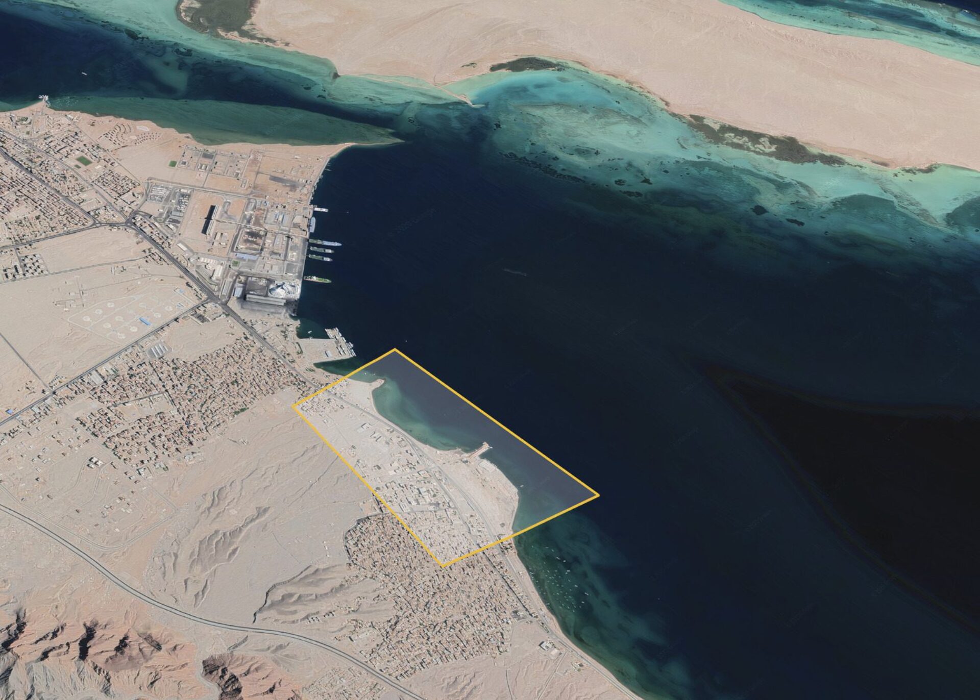 A satellite view of a coastline with yellow square outlining the area for the purposed Safaga Port.