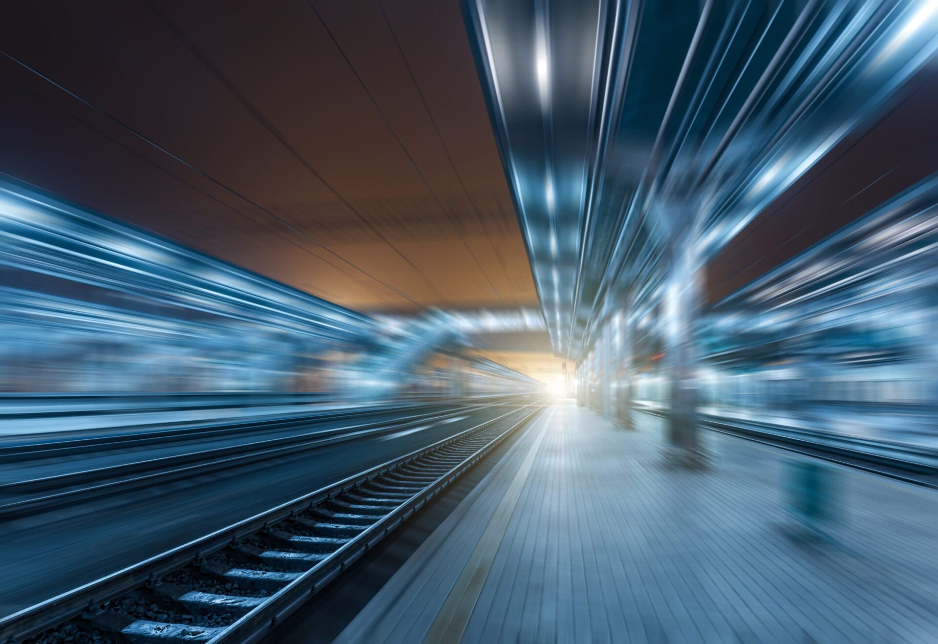 Railway,Station,At,Night,With,Motion,Blur,Effect.,Cargo,Train