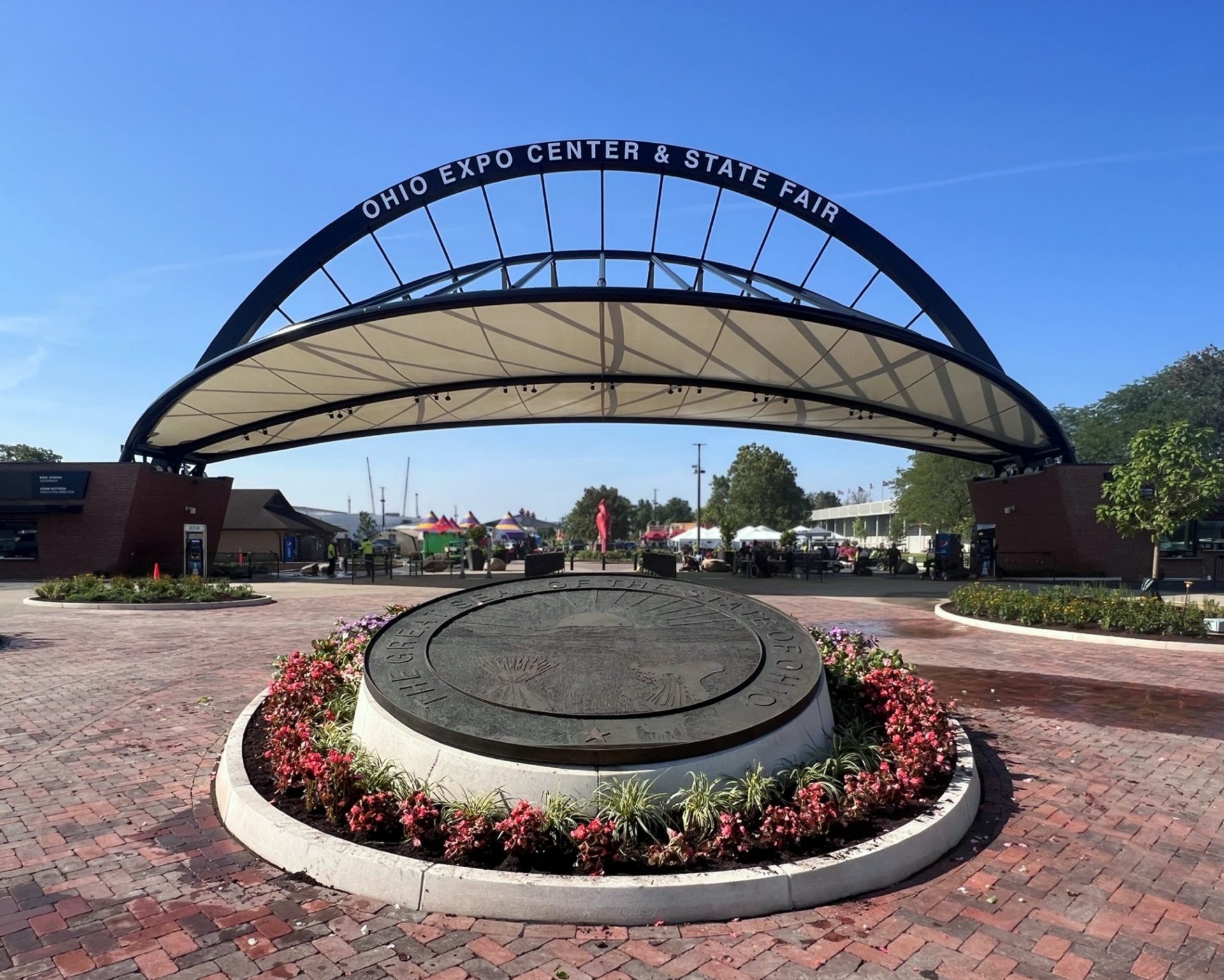 The entrance of the Ohio Expo Center and State Fair, featuring a decretive, arching steel structure
