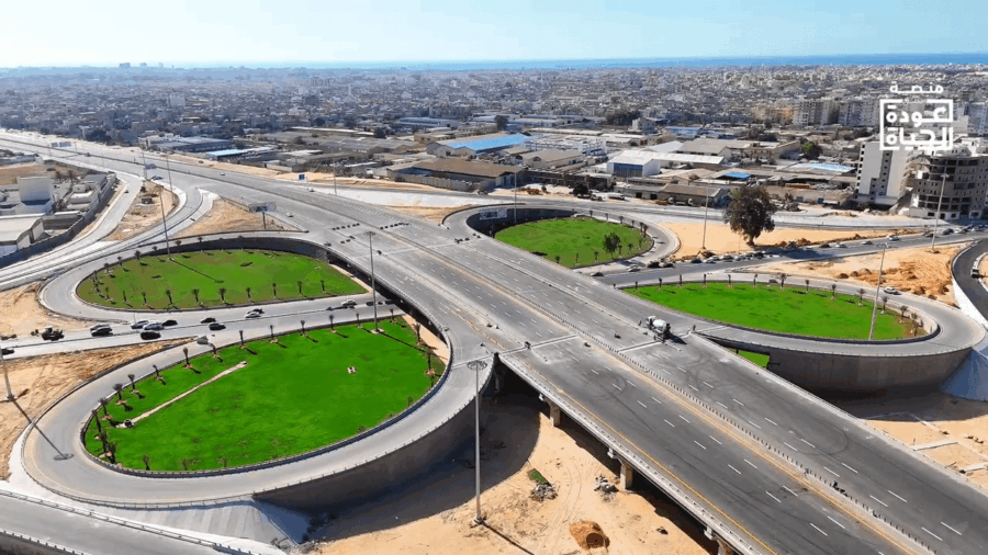 A large freeway intersection in the middle of a city.