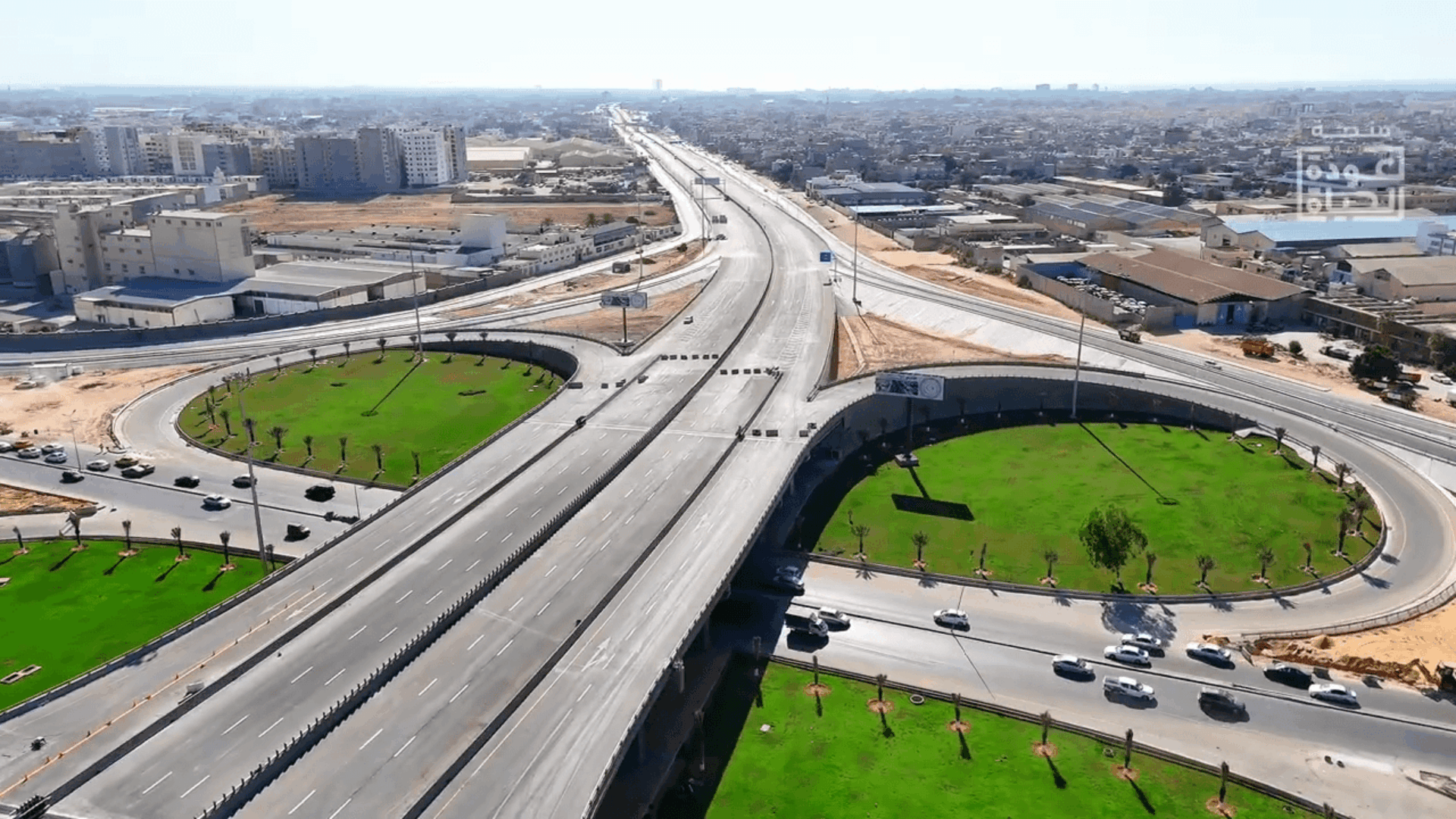 A large freeway intersection in the middle of a city.