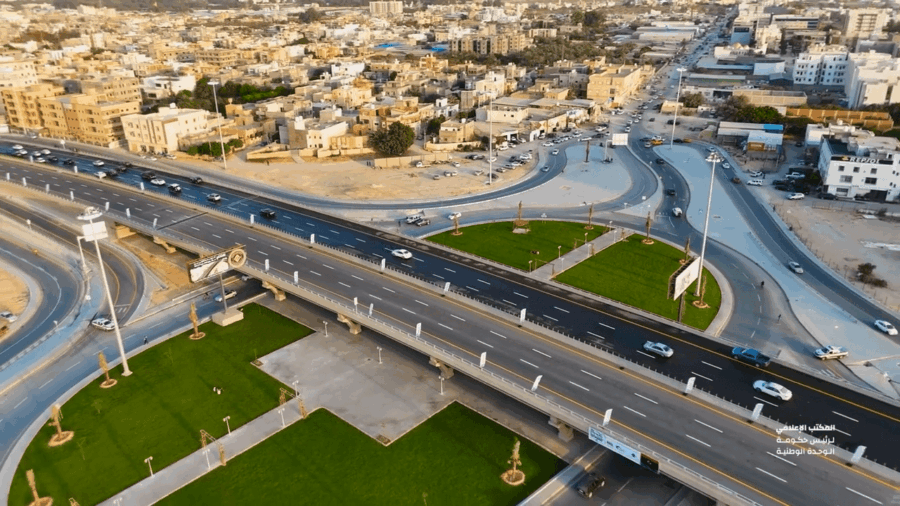 A segment of Freeway, spanning over a small park and other roads.